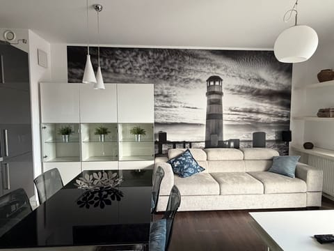 Deluxe Apartment | Living area | Flat-screen TV