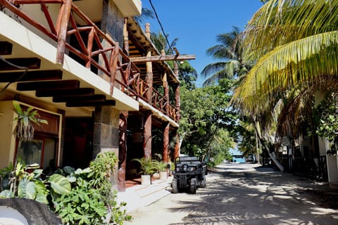 Beach nearby, white sand, beach towels