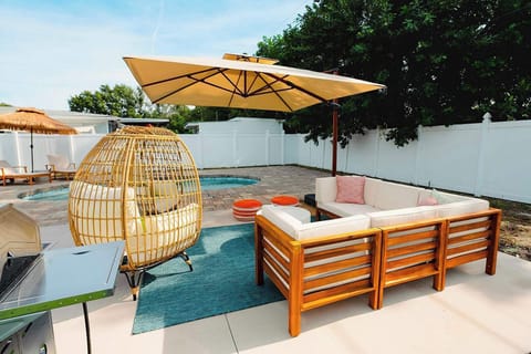  Sink into the sectional, sway in the egg chair, and let the Florida sun do the rest. 