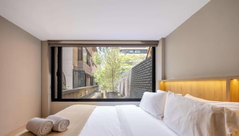Apartment, 2 Queen Beds, Patio, City View (Gardens B103) | 2 bedrooms