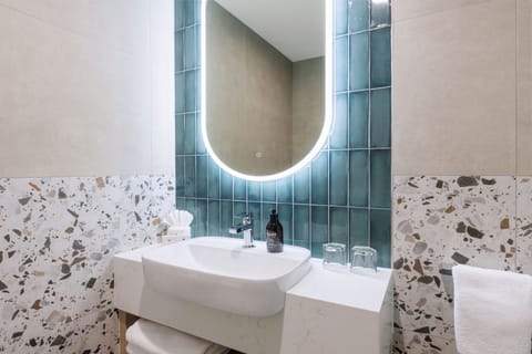 Eco-friendly toiletries, hair dryer, towels