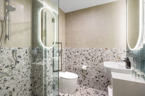 Eco-friendly toiletries, hair dryer, towels