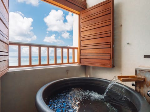 Private open-air Onsen bath / Deluxe Twin Room with Tatami Area / Ocean View | Down comforters, in-room safe, desk, blackout drapes