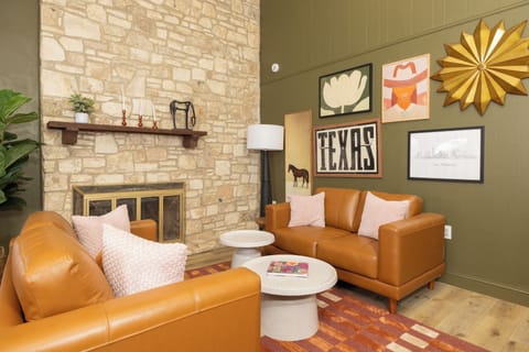 Cozy sitting area with fireplace — a quiet spot for conversation, reading, or winding down