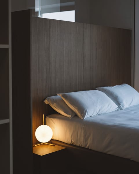 Premium bedding, down comforters, memory foam beds, minibar