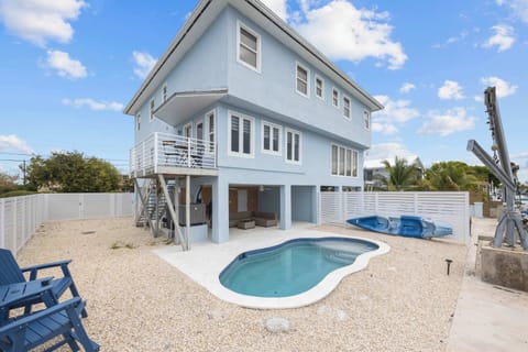 Skip the boat ramp. Launch kayaks, cool off in the pool, and dock right at home.