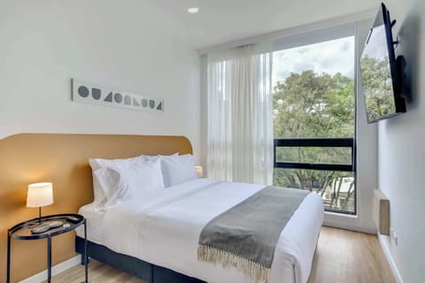 Comfortable bed with TV for your relaxation