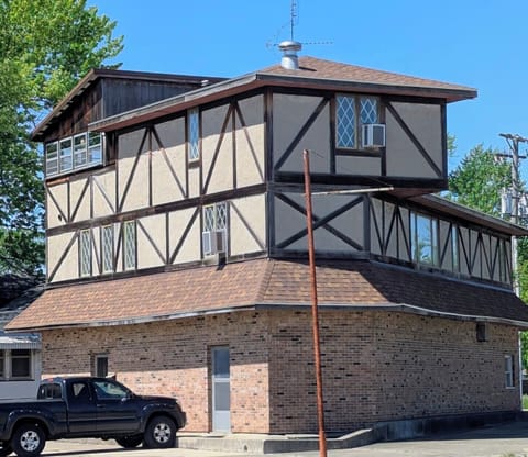 Exterior off street parking and a private entrance for apartment.