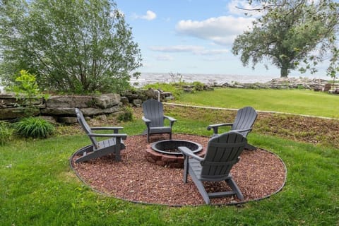 Gather around the fire with waterfront views.