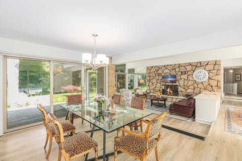 OVERVIEW:  The beautiful dining room and living room.