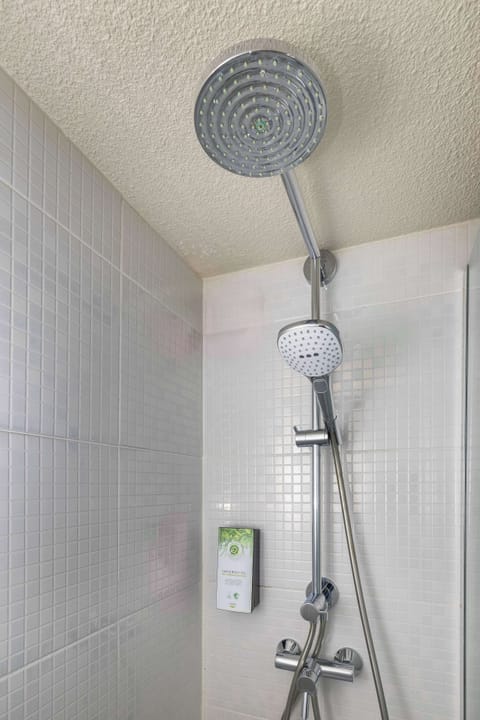 Rainfall showerhead, eco-friendly toiletries, hair dryer, towels
