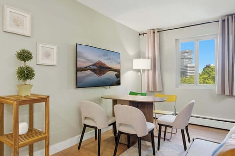 Share meals and conversations in a bright dining space perfect for slow mornings or cozy dinners.