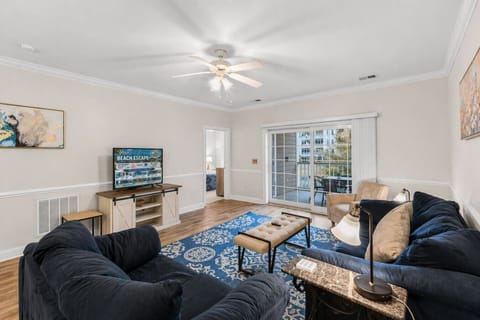 Gather, relax, and unwind in this bright, spacious coastal living room designed for comfort and connection. Featuring plush oversized seating, coastal-inspired décor, a large smart TV for movie nights, and beautiful natural light, this inviting space is p