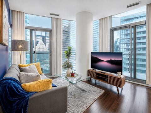 Comfort Suite, 1 Bedroom, City View | Living area | 50-inch flat-screen TV with digital channels