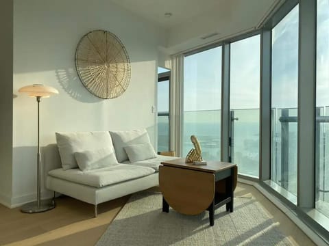 Deluxe Suite, 2 Bedrooms, Non Smoking | Living area | 50-inch flat-screen TV with digital channels