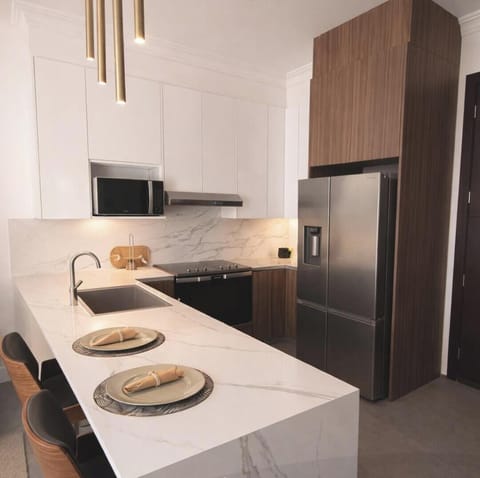 Apartment, Balcony, Mountain View | Private kitchen | Full-size fridge, microwave, oven, stovetop