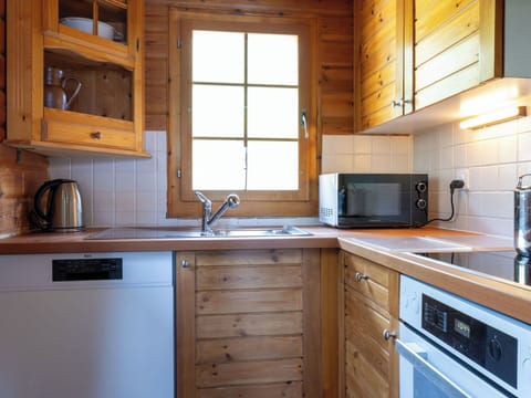Kitchen, Cabinetry, Wood, Countertop, Sink, Flooring, Furniture, Kitchen Appliance, Interior Design, Plumbing Fixture