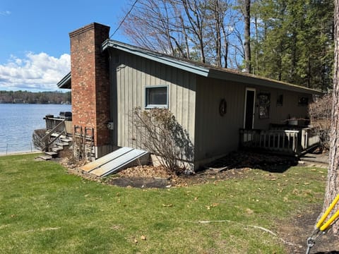 Charming lakefront cabin with private beach access and rustic comfort awaits your peaceful getaway.