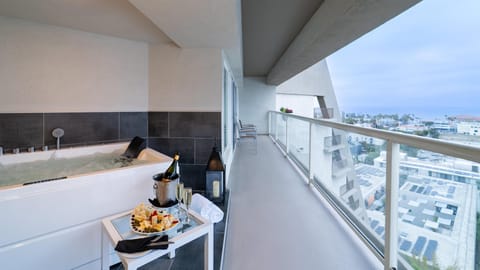 Suite, 1 King Bed (Sunset) | Premium bedding, down comforters, in-room safe, individually decorated