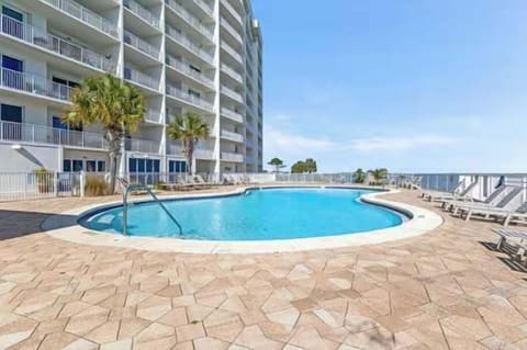 Resort-style pool at Harbour Pointe in Perdido Key, perfect for soaking up the Florida sunshine while enjoying beautiful waterfront surroundings just steps from your vacation rental.