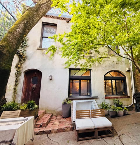 The Carriage House is tucked behind a street-facing building and courtyard.