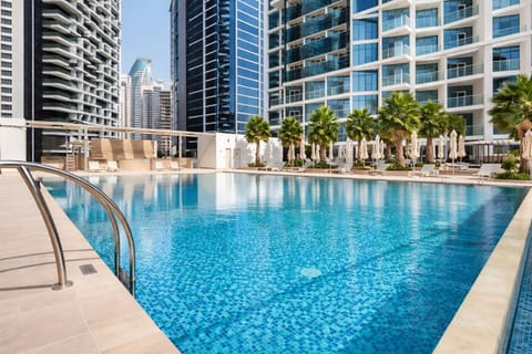 2 outdoor pools, open 8:00 AM to 10:00 PM, pool umbrellas, sun loungers