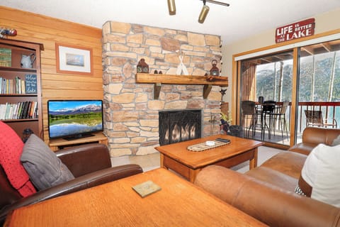 Comfortable Open Living Area w/ Balcony Access