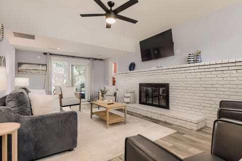 Cozy Living Room with Brick Fireplace