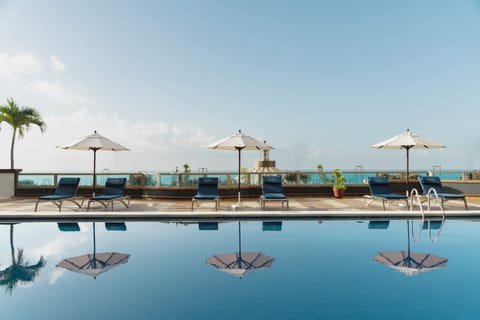 Outdoor pool, open 10:00 AM to 7:00 PM, sun loungers