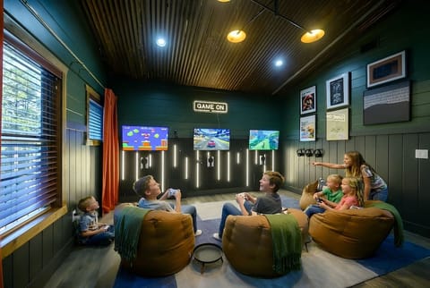 The kids will love their own zone with 3 Xbox consoles and 3 arcade games all next to the Bunkbed room.  