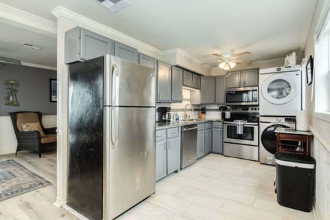 Full kitchen with full sized washer & dryer 