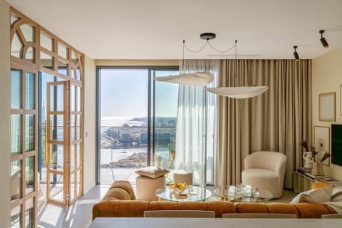 Living room - floor-to-ceiling light and elegant design create a stunning, inviting living space