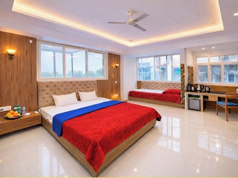 Premium bedding, desk, laptop workspace, soundproofing