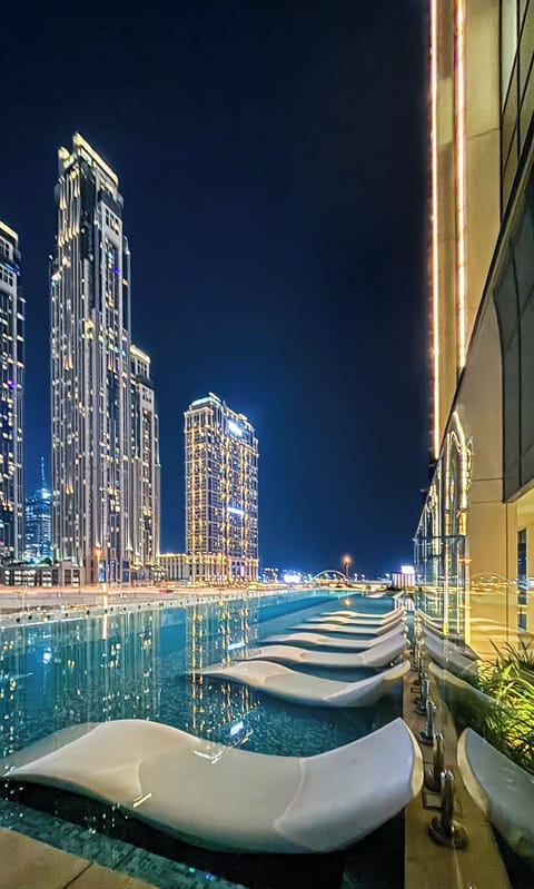 2 outdoor pools, open 8:00 AM to 10:00 PM, pool umbrellas, sun loungers