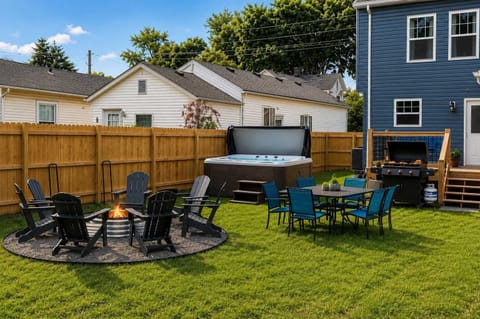 Backyard: Enjoy the expansive backyard featuring a hot tub, grill, outdoor seating, and plenty of open space to relax, dine, and gather with loved ones.