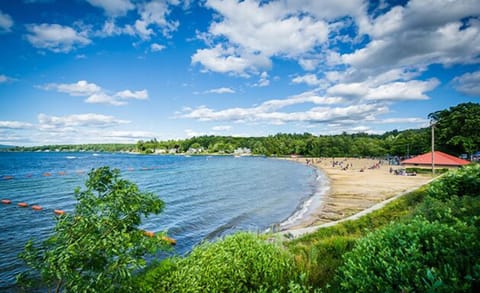 Walk down the boardwalk to Weirs Beach