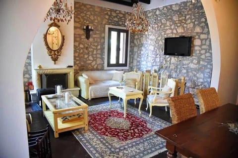 Spacious living area with traditional decor and modern comfort