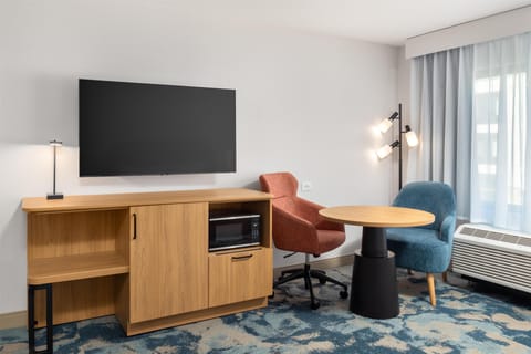 Premium bedding, Tempur-Pedic beds, desk, laptop workspace