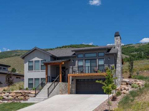Stunning front entry and exterior of this contemporary mountain retreat