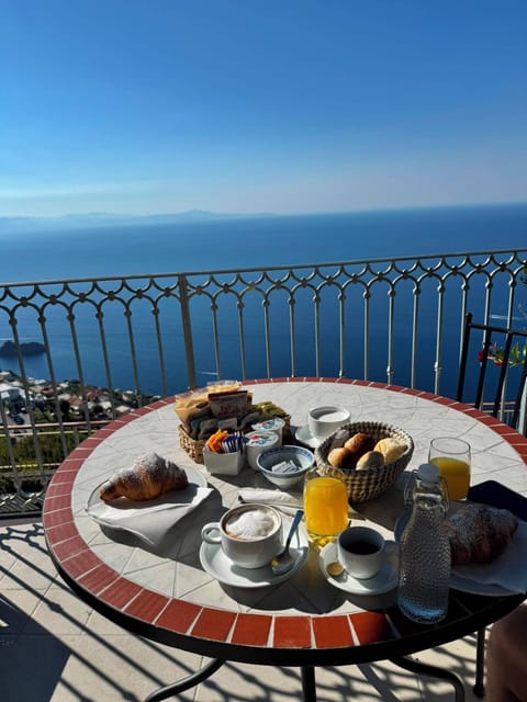 Triple Room, Sea View (Leo) | Breakfast meal | Free daily cooked-to-order breakfast