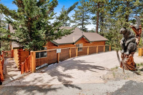 Spacious gravel parking area with room for multiple vehicles perfect for groups arriving in separate cars. Gated entry adds privacy and a great first impression on arrival.