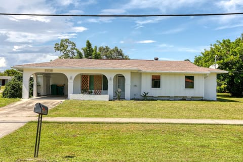 Inviting exterior with convenient parking for up to two vehicles.