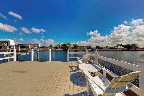Private dock and scenic waterway offering easy access for boating and kayaking, perfect for enjoying peaceful days on the water and outdoor adventures.