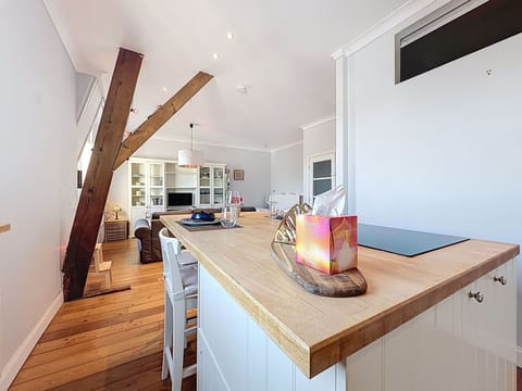 Furniture, Interior Design, Flooring, Wood Flooring, Floor, Wood, Cabinetry, Kitchen, Ceiling, Countertop