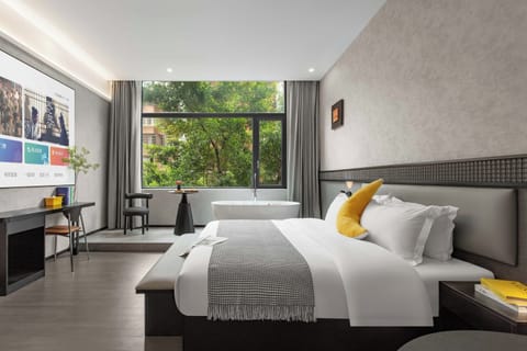 Senior Double Room, City View | Laptop workspace, blackout drapes, soundproofing, iron/ironing board