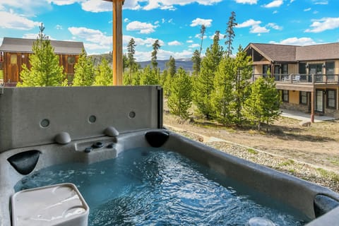 Unwind in your private hot tub while soaking in breathtaking mountain views and crisp alpine air.
