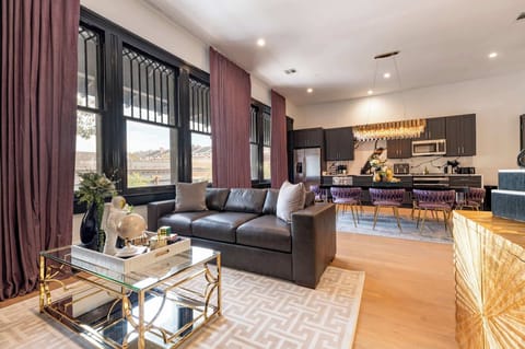 Living / Dining Area. Dining table seating for eight and queen sleeper sofa.