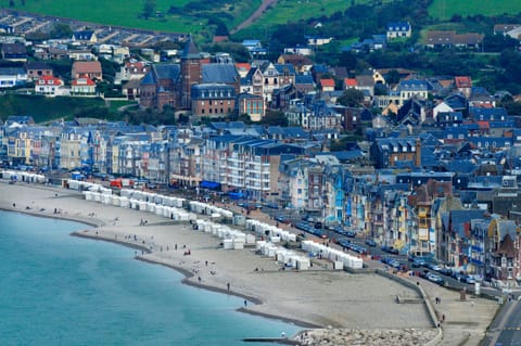 Feel the ocean breeze as you walk along the expansive beach, just steps from your doorstep