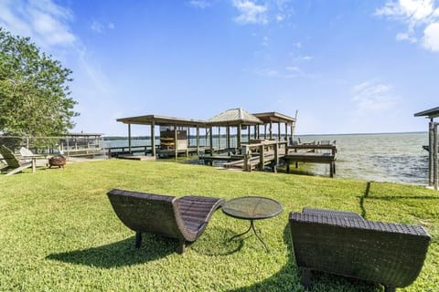 Backyard | Covered Boat Dock | Fire Pit & Lake Views