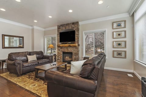 A bright and inviting gathering space with elegant finishes and cozy seating, designed for connection, conversation, and unwinding after a day outdoors.